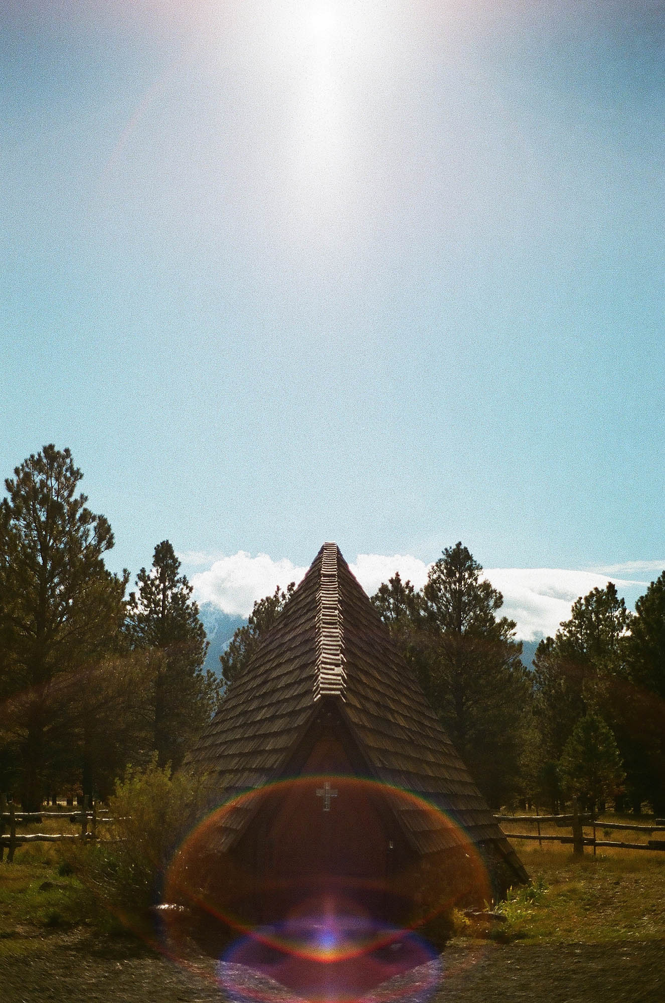 The exterior of a small A-frame church