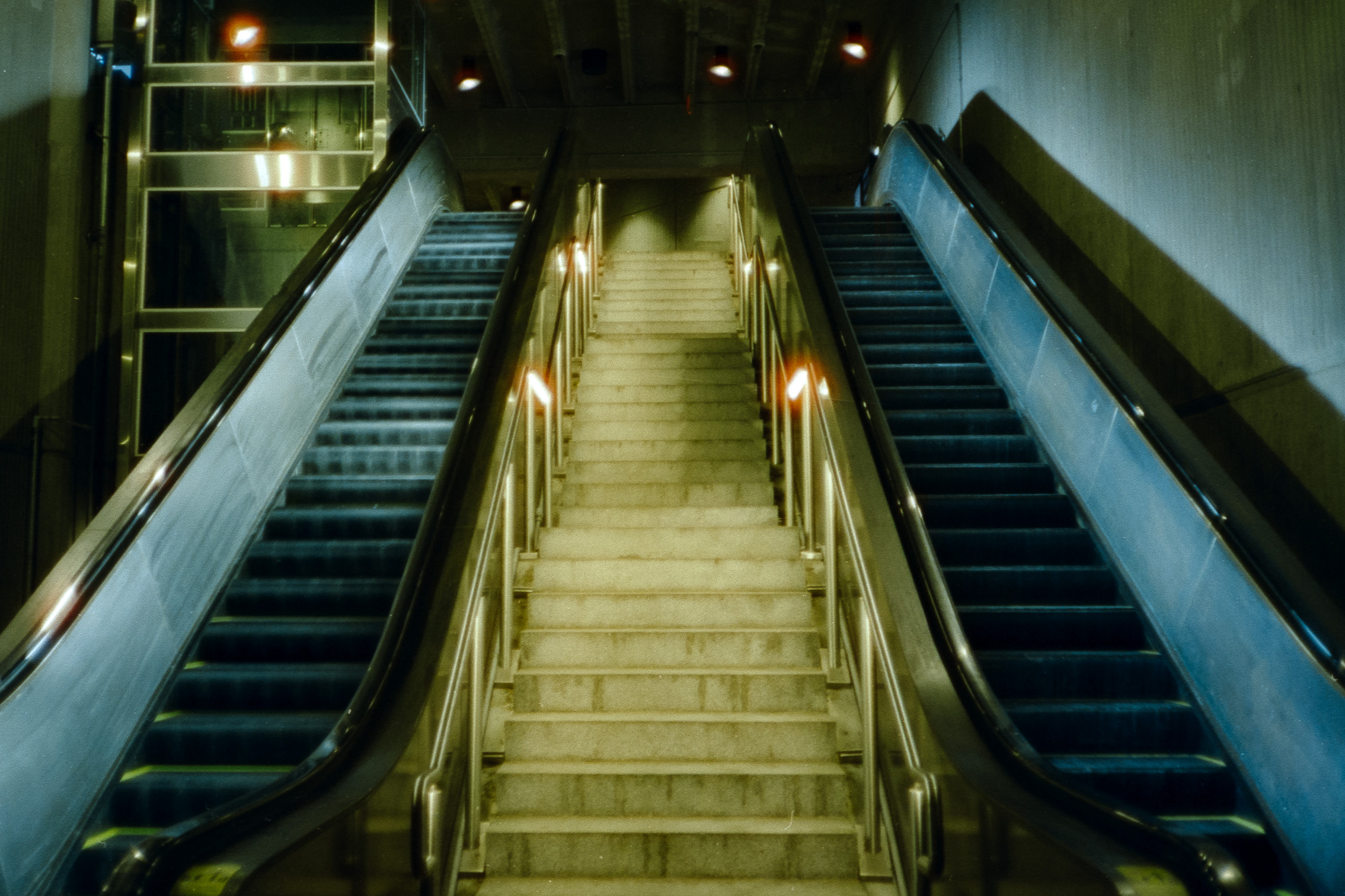 Escalators and stairs going up at a DC Metro stop