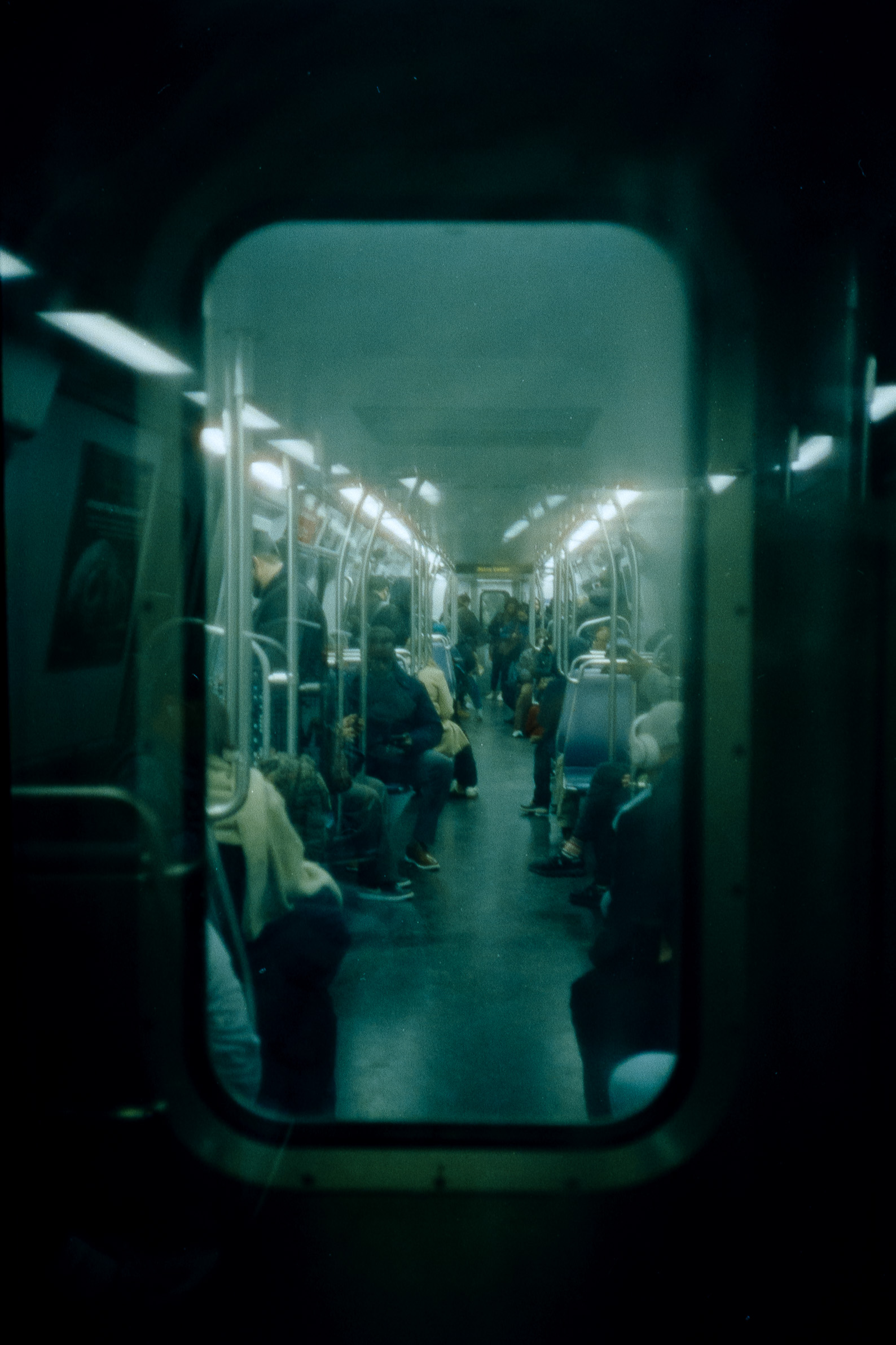 Looking through the rear window in a DC Metro car