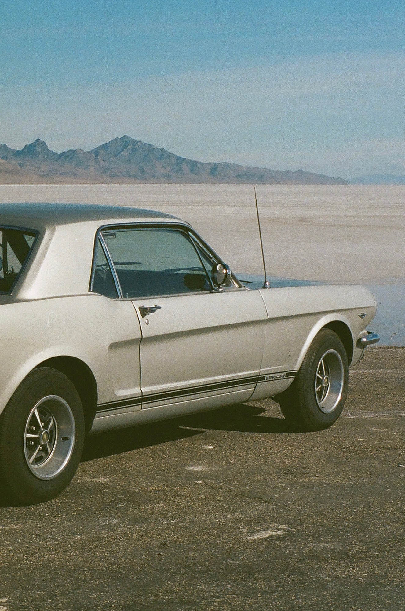 A vintage Ford Mustang at the salt flats