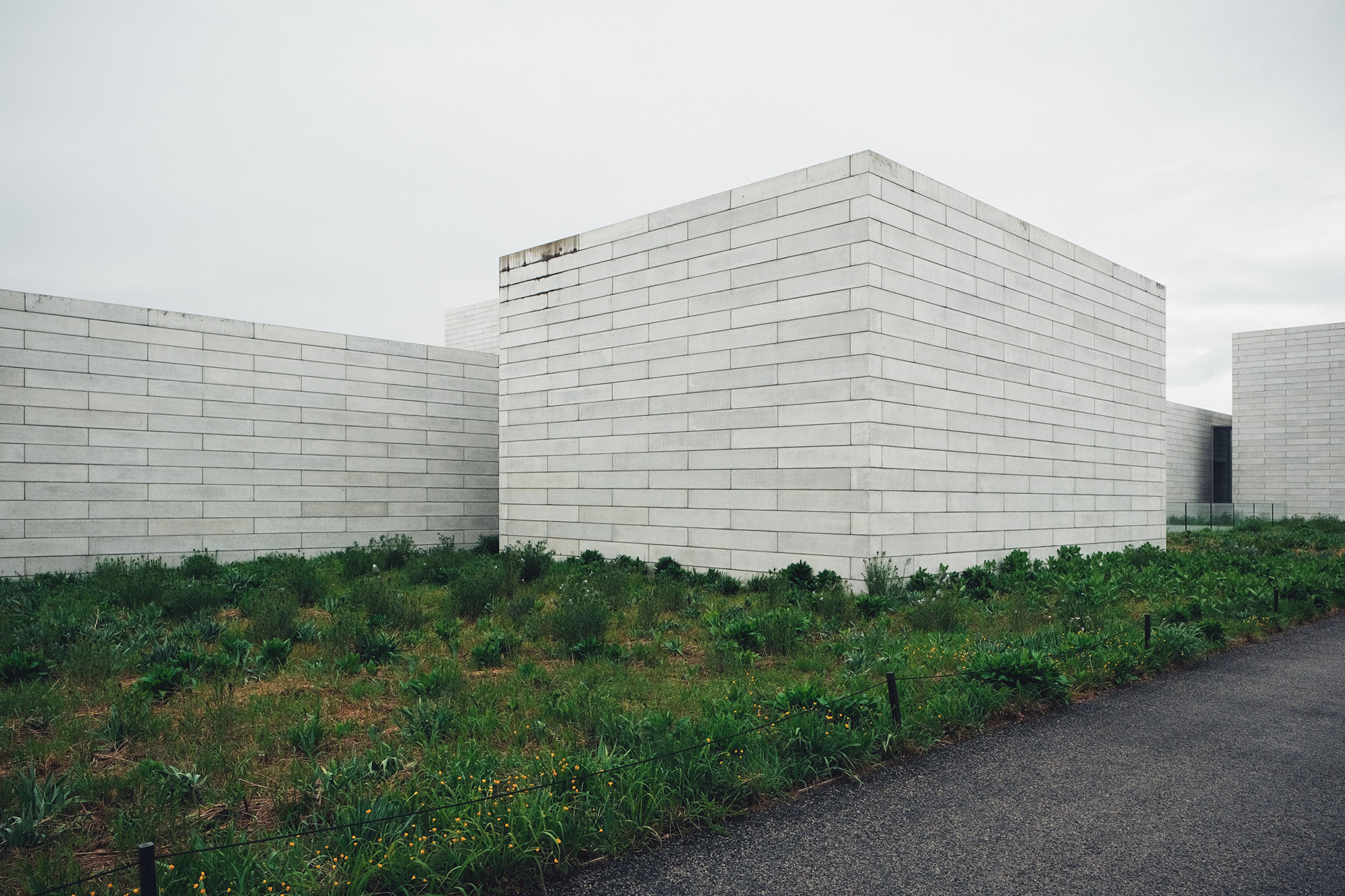 An abstract building in a field