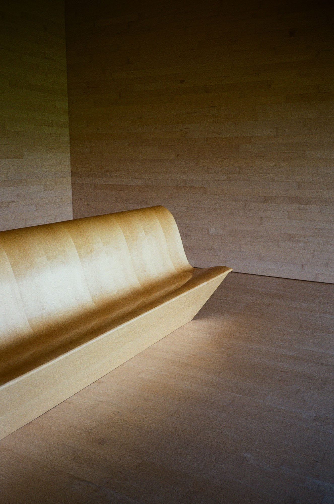A built-in wood bench in the library