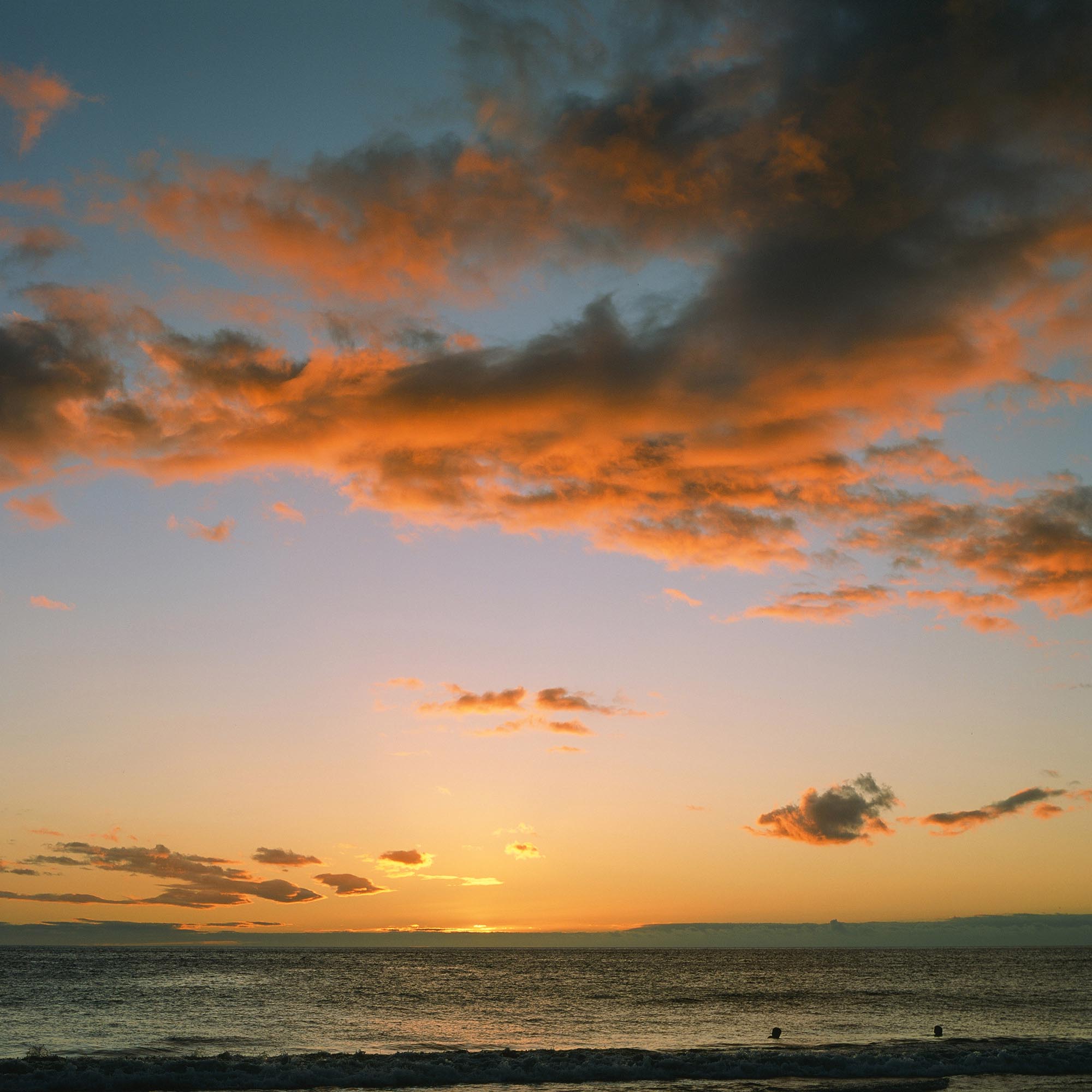 A beach on Hawaii at sunset