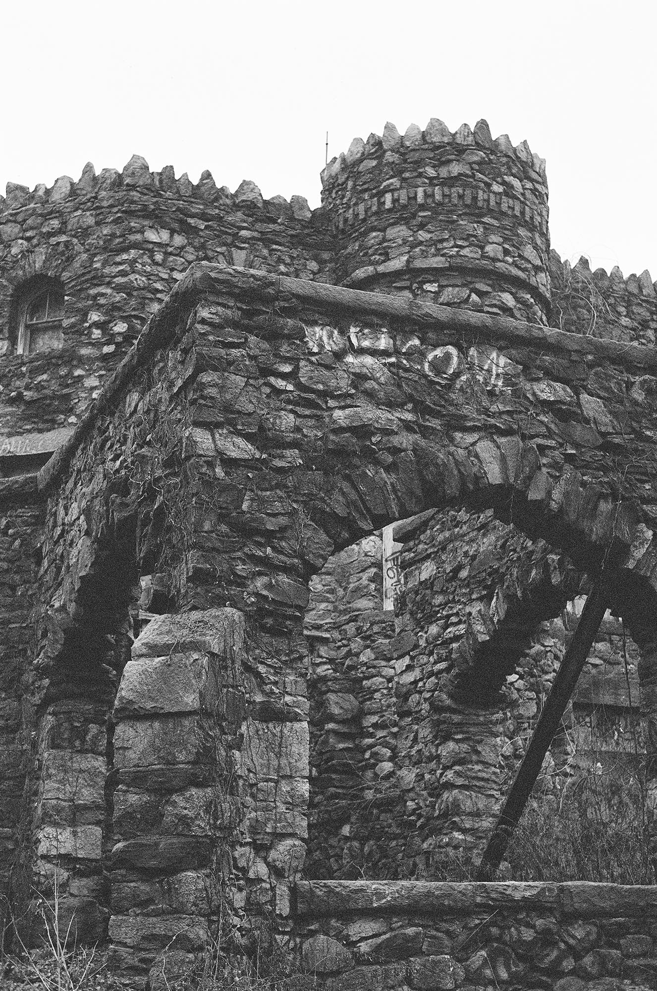 Details of an abandoned stone castle in the woods