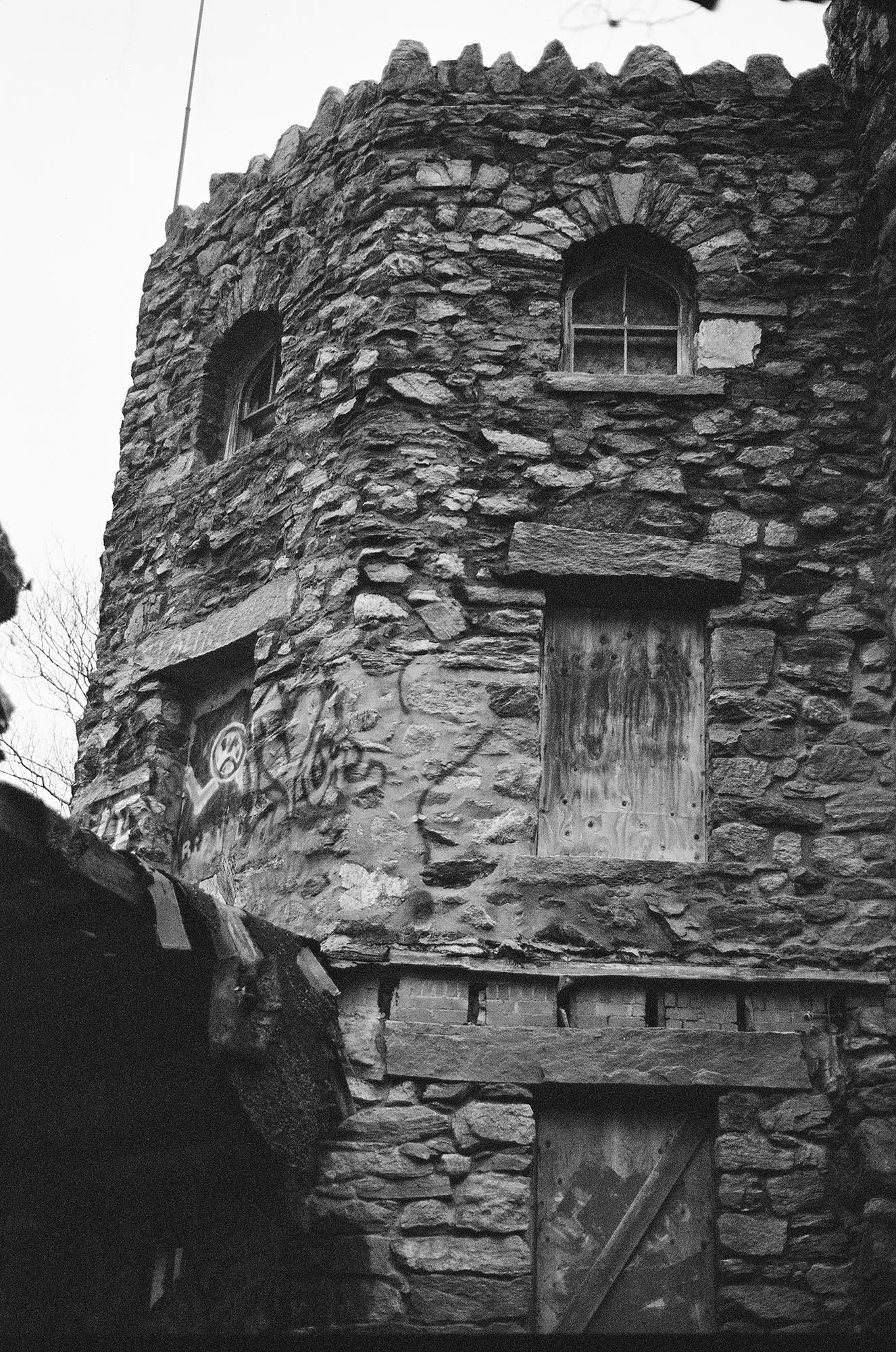 Details of an abandoned stone castle in the woods