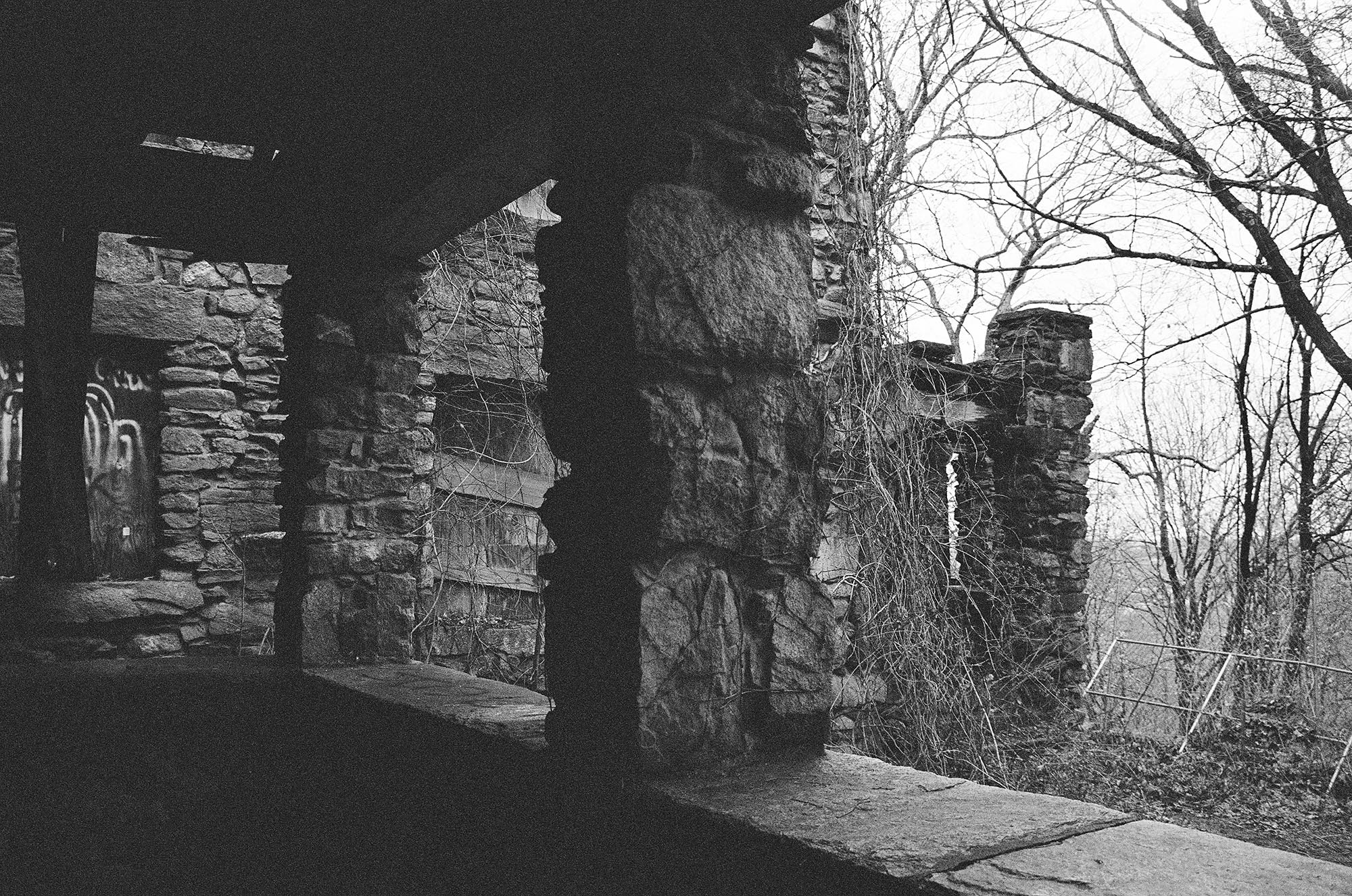 Details of an abandoned stone castle in the woods