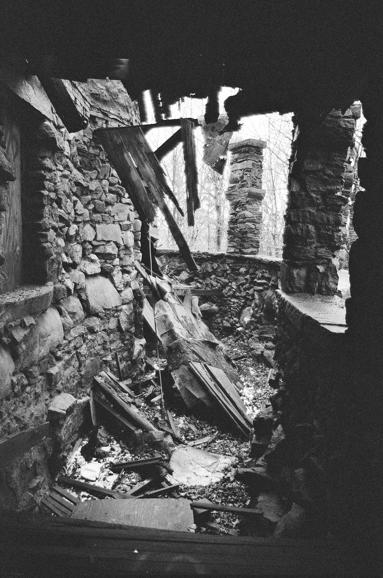 Details of an abandoned stone castle in the woods