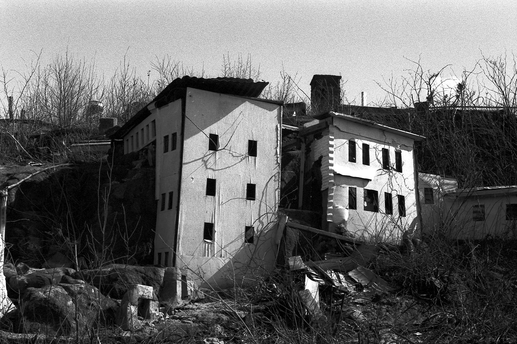 A miniature model of Bethlehem made of plywood, decaying, set into a hill