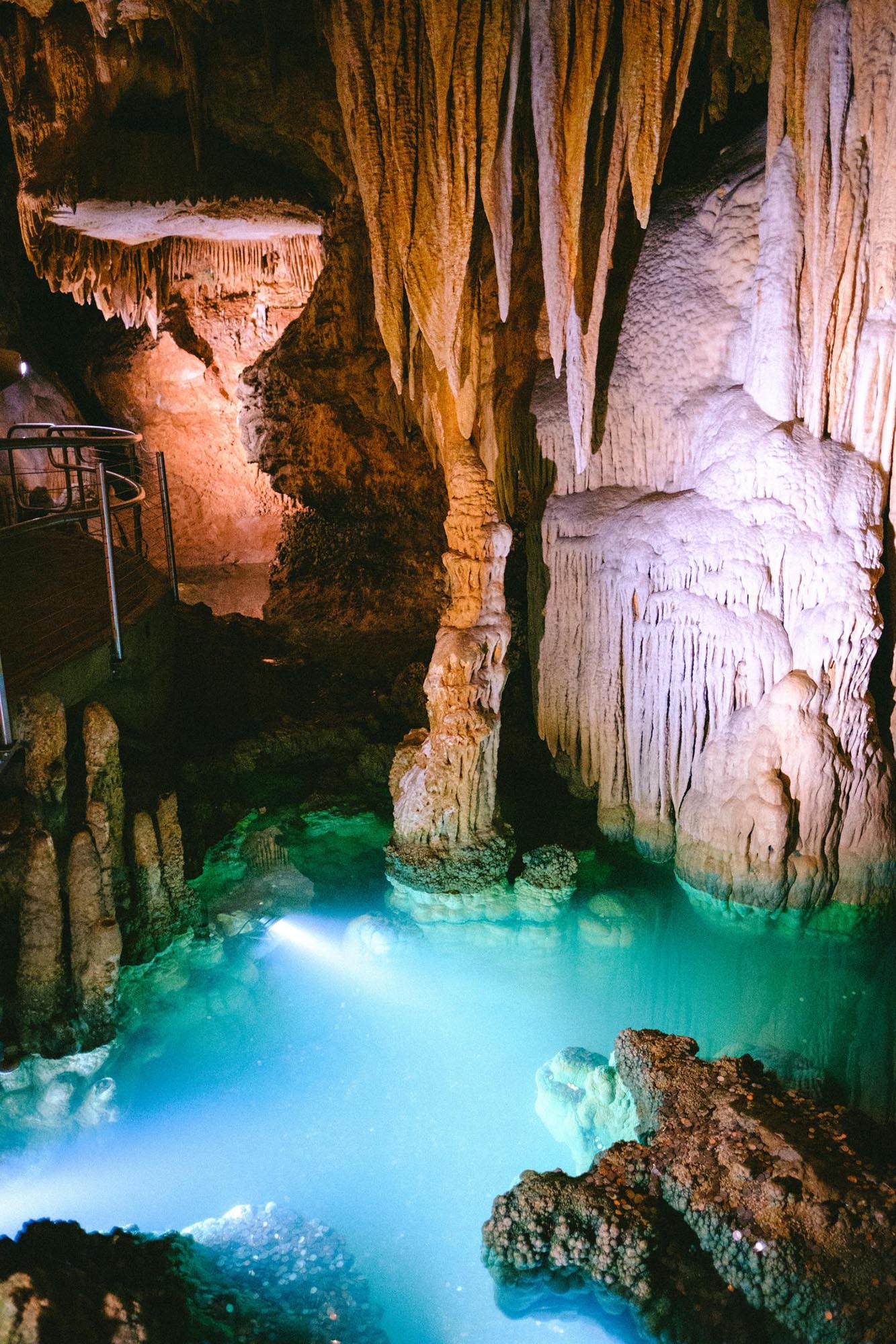 A blue body of water in a cave