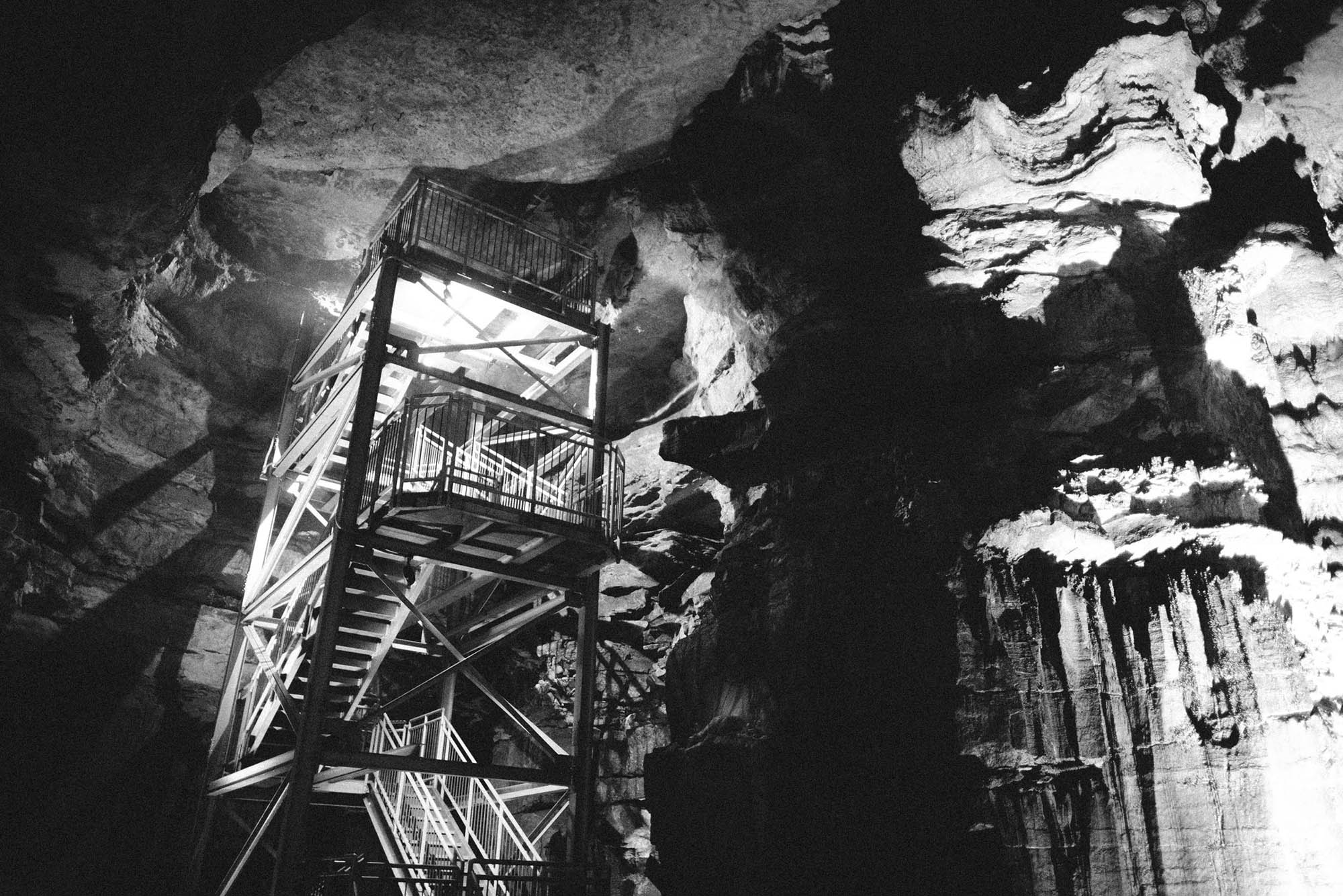 A stair tower ascending out of a cave