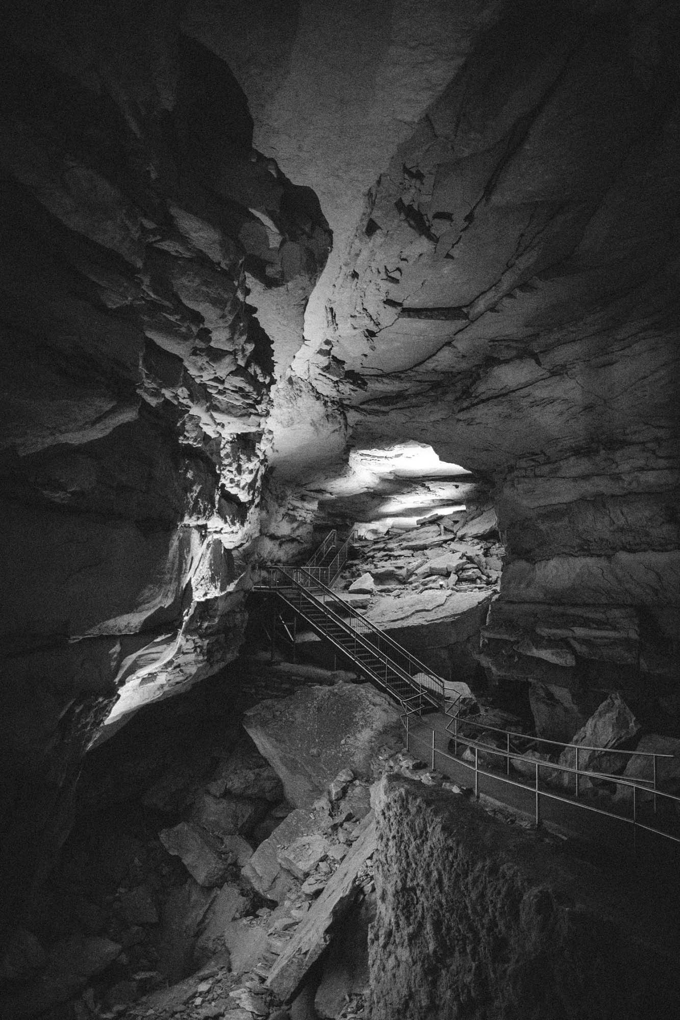 A cave passageway with collapse rock around