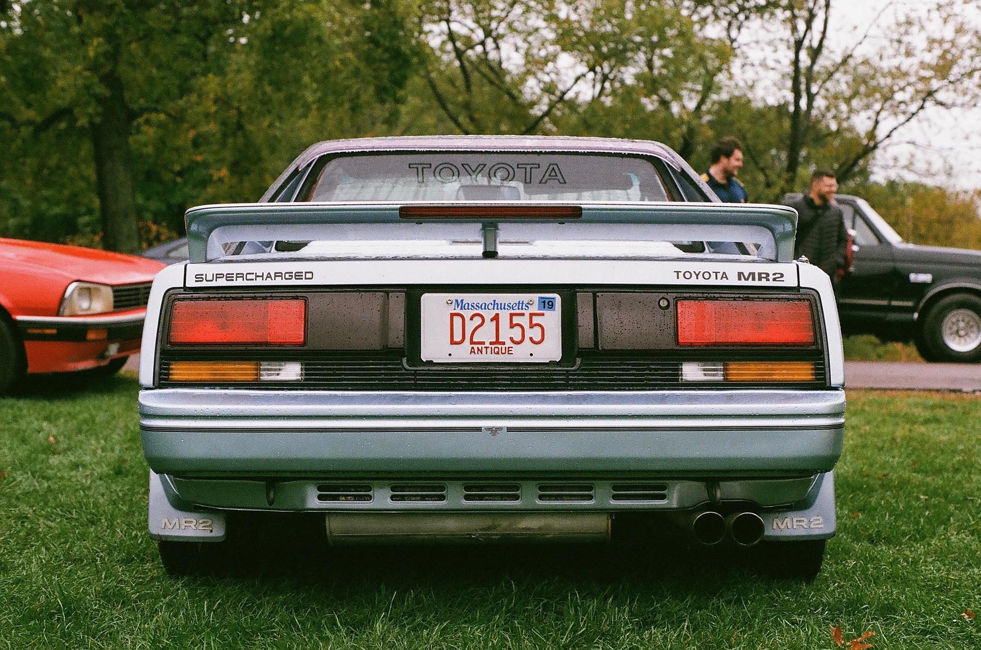 The rear of a light blue Toyota MR2