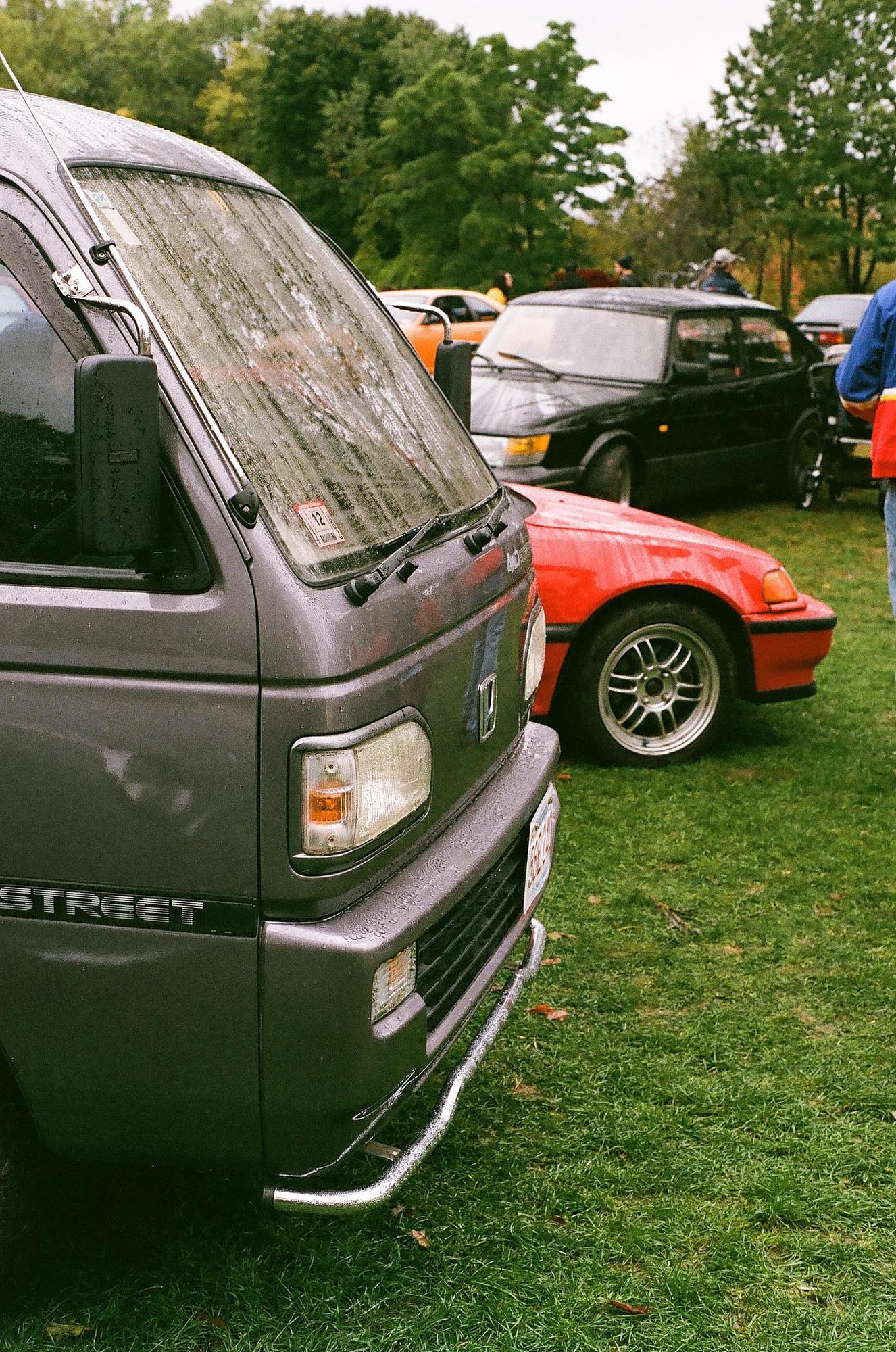 The front of a gray Honda Acty kei van