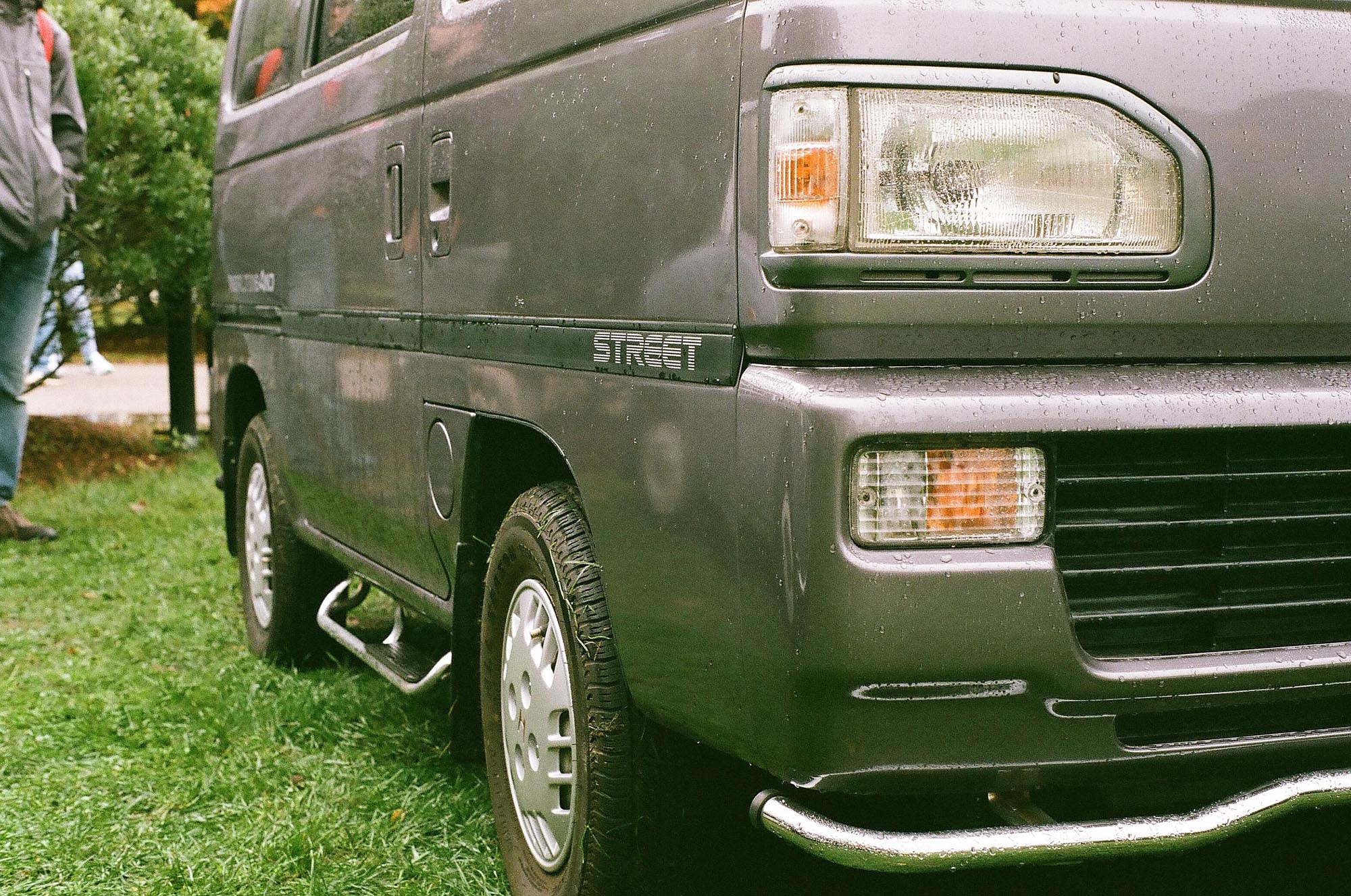 The front of a gray Honda Acty kei van