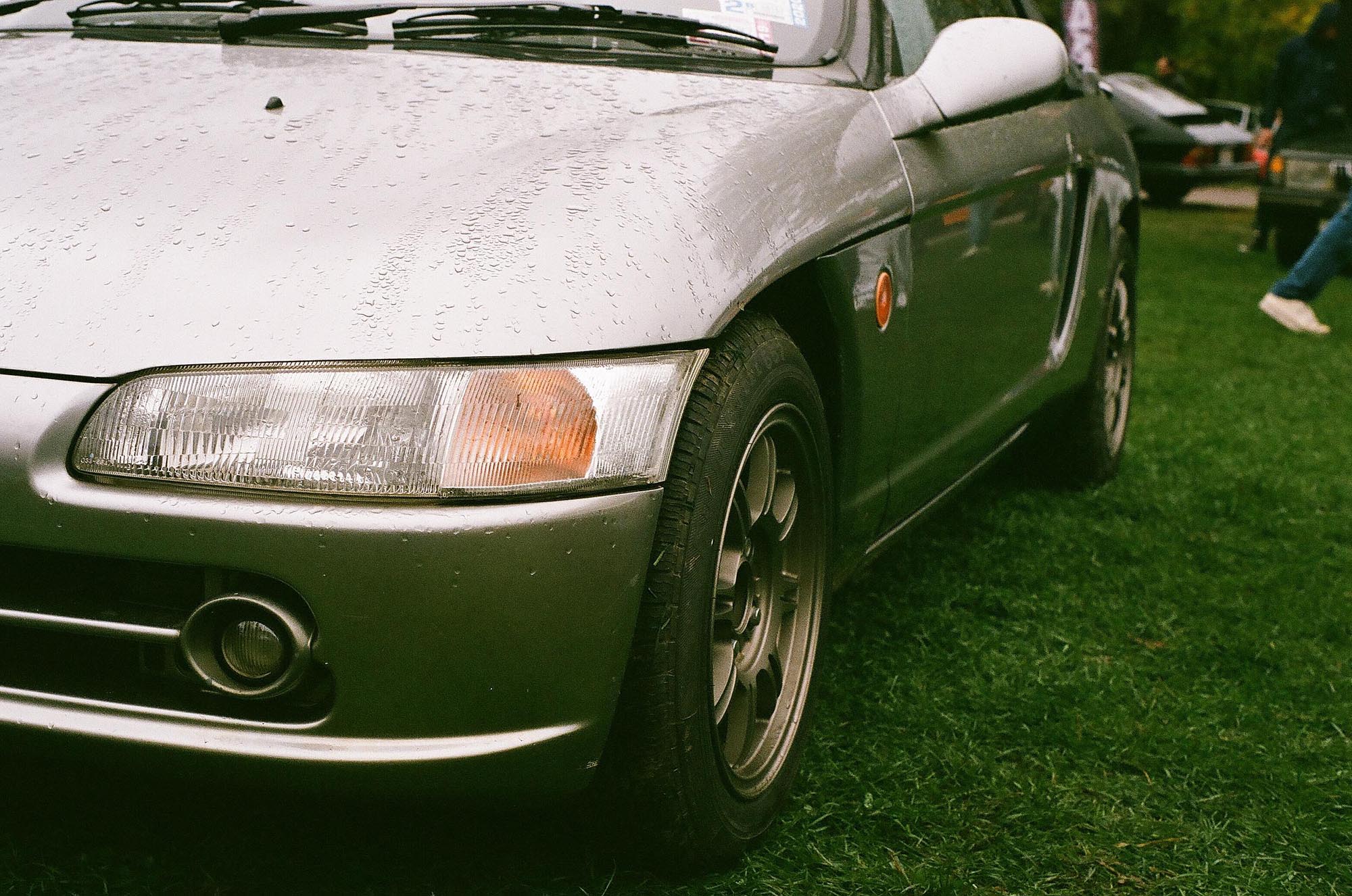 The front side profile of a black Saab 900