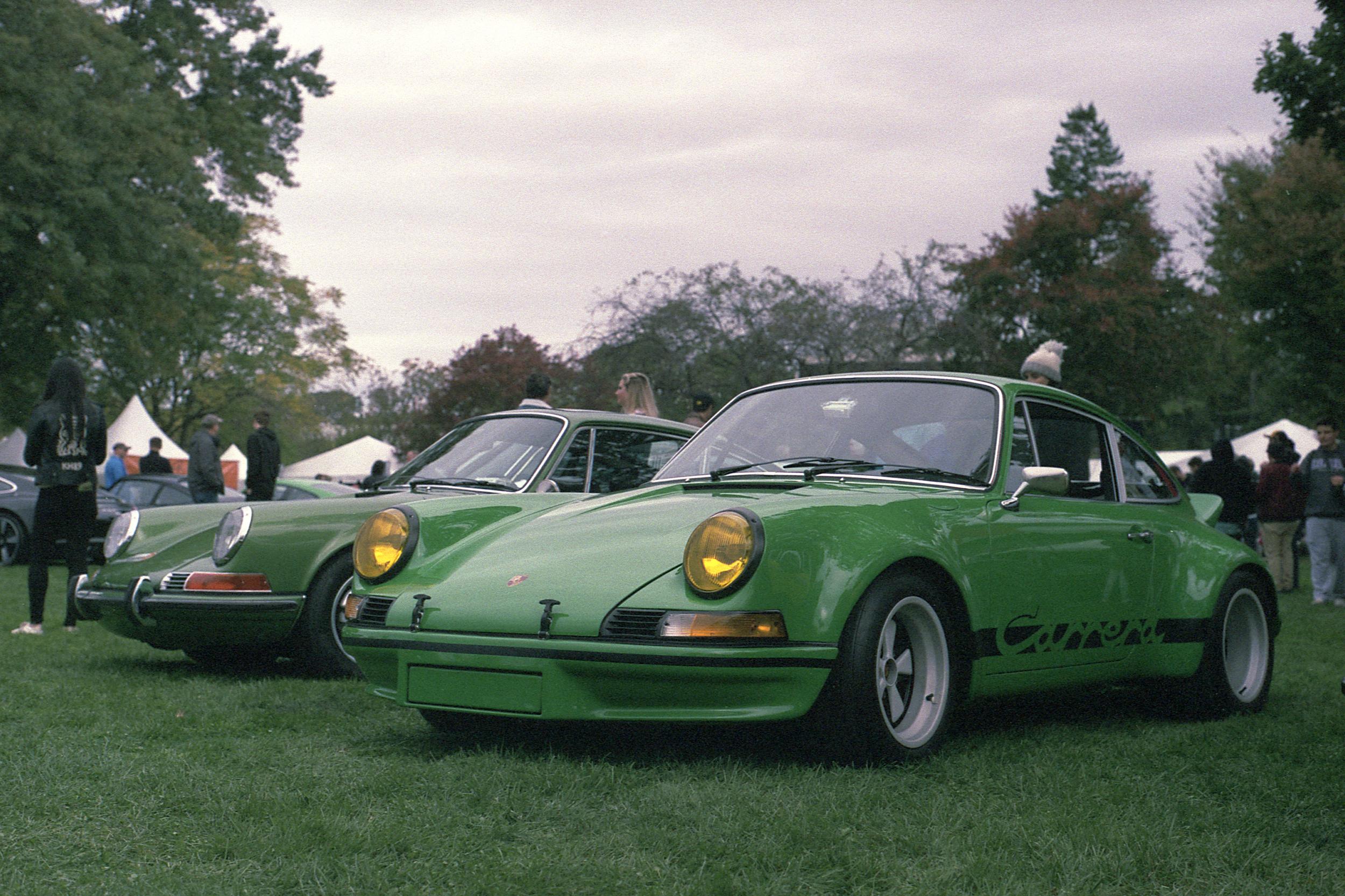 Two green vintage Porsche 911s