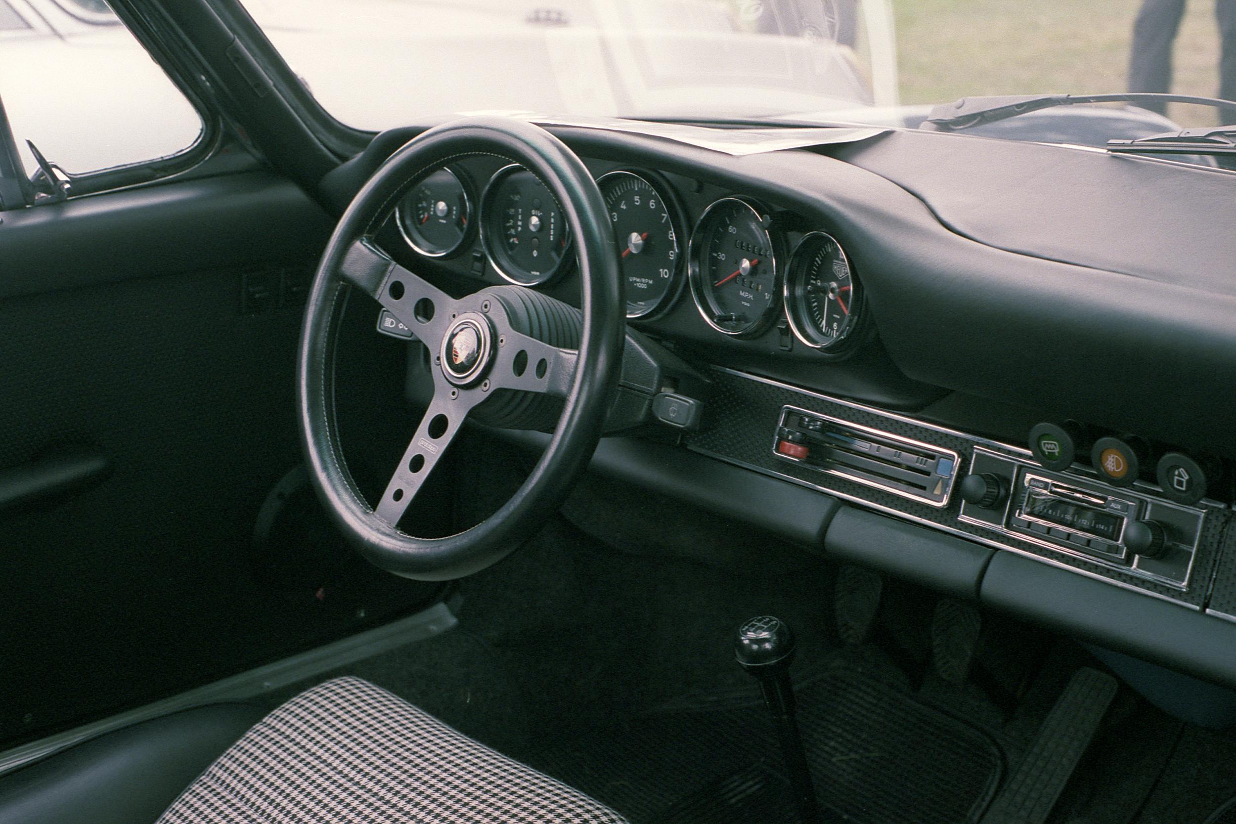 The interior of a vintage Porsche 911