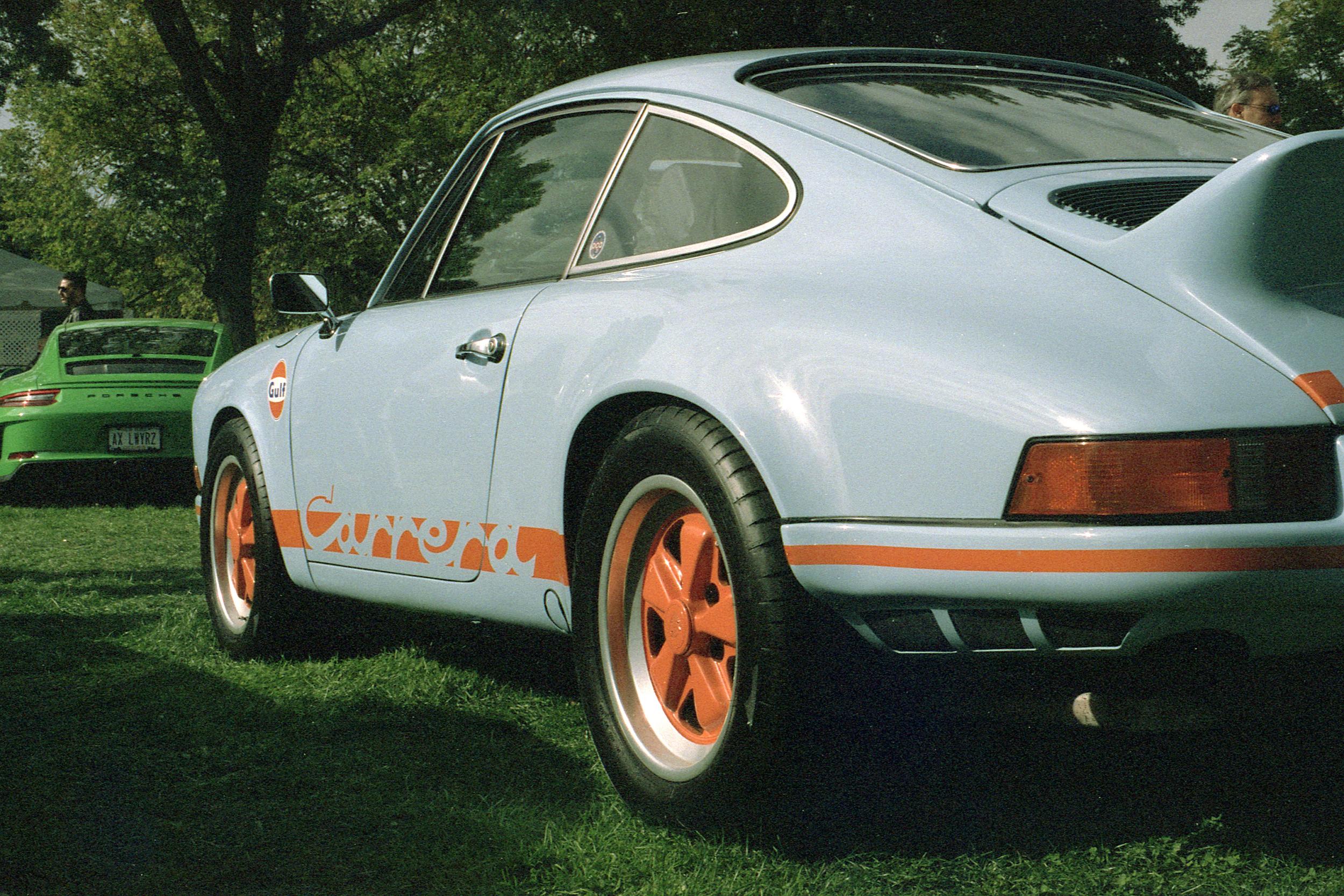 A blue and orange vintage Porsche 911