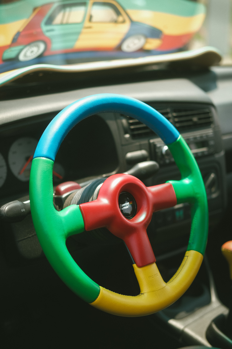 A multicolor steering wheel in a VW Golf Harlequin