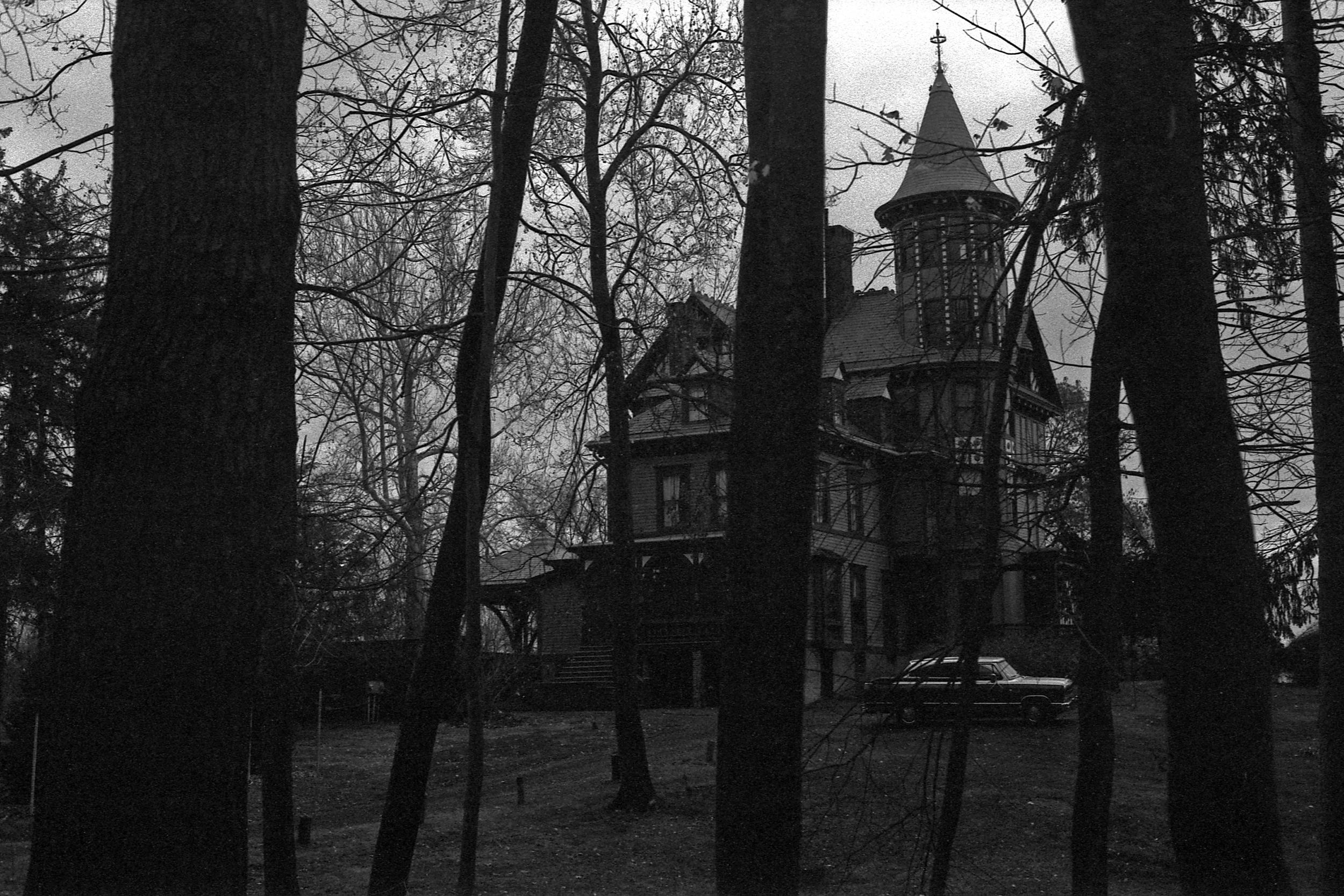 The Wilderstein mansion through the trees