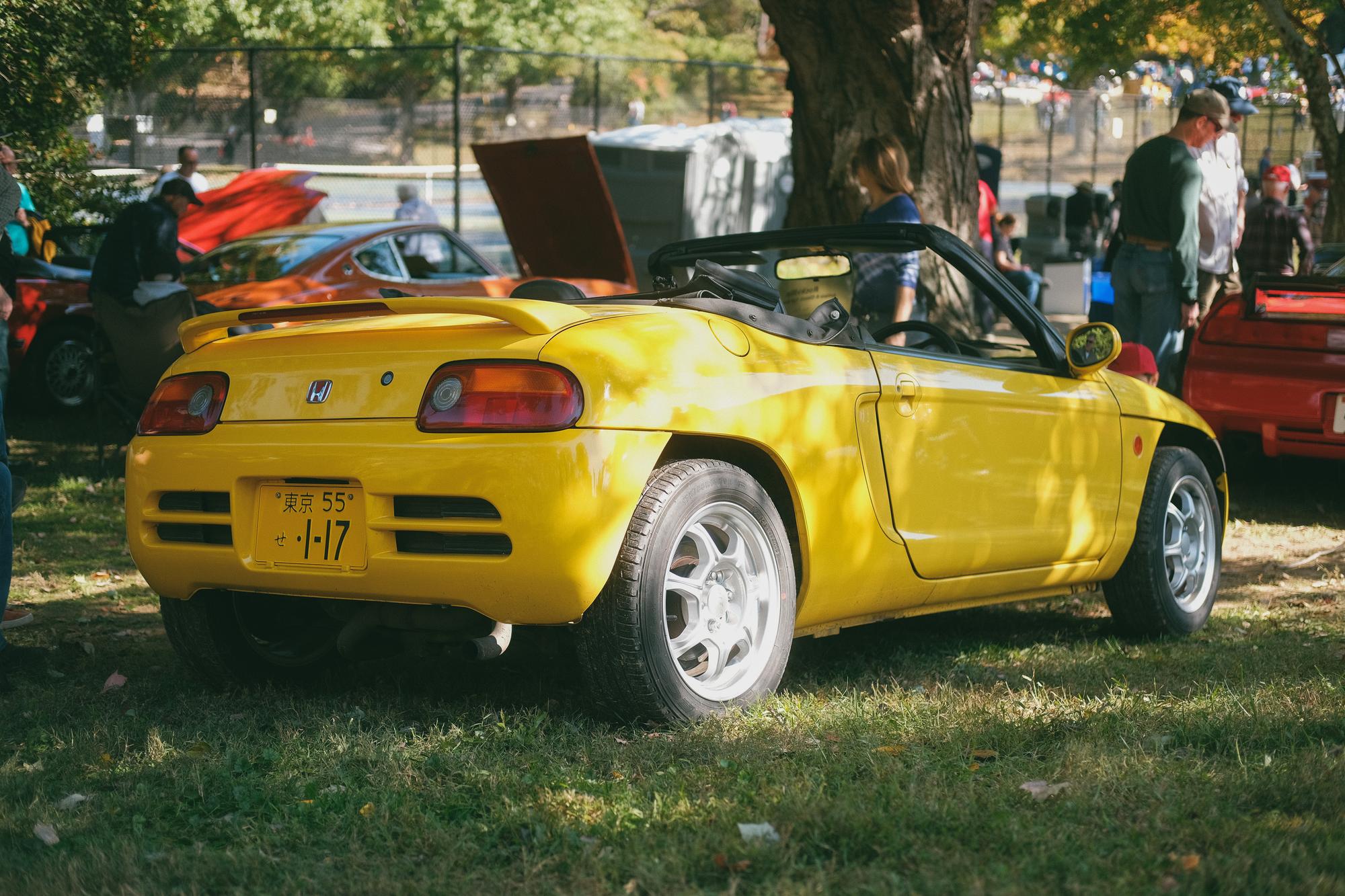 A yellow Honda Beat