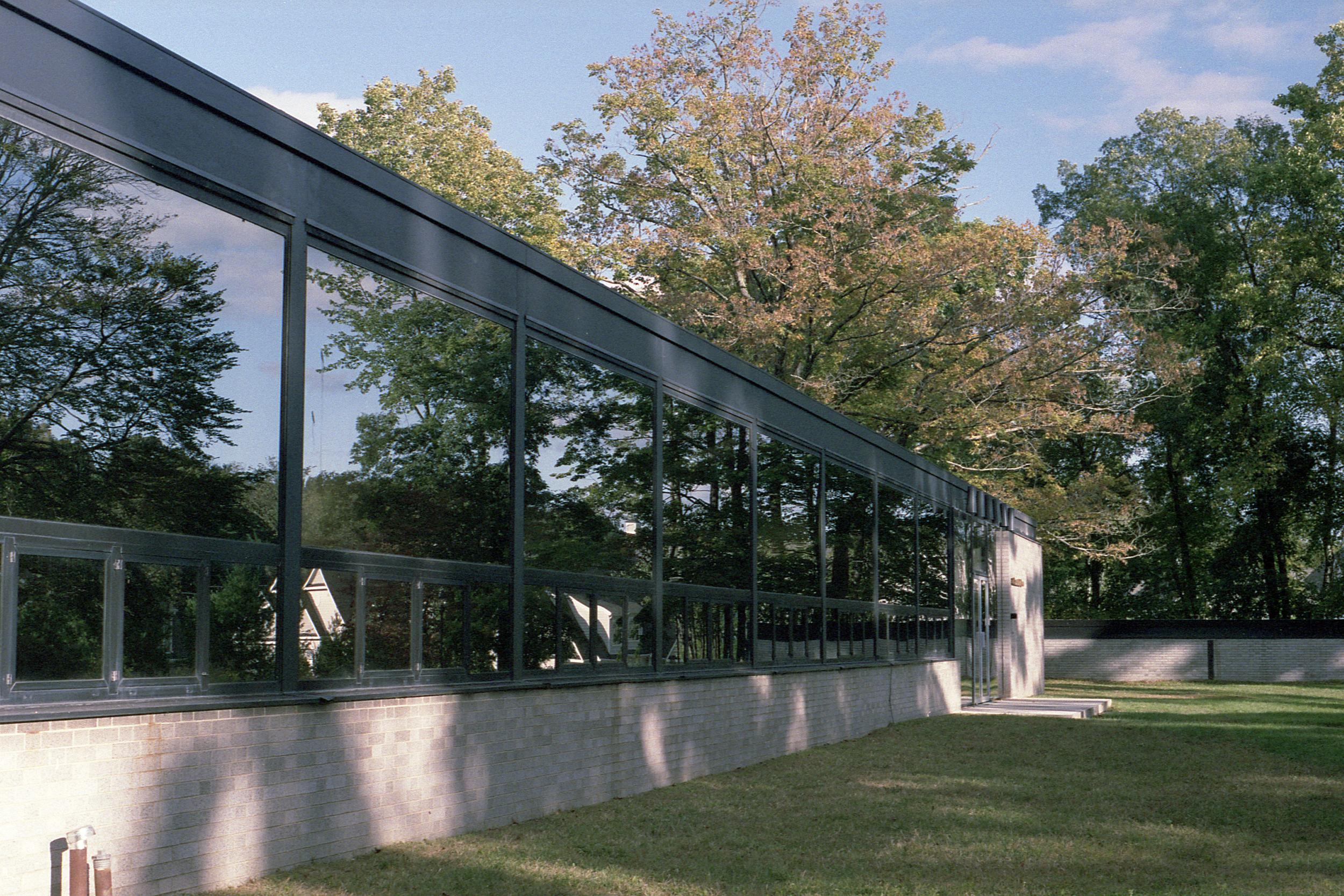 The exterior of the building, a single story Modernist office building