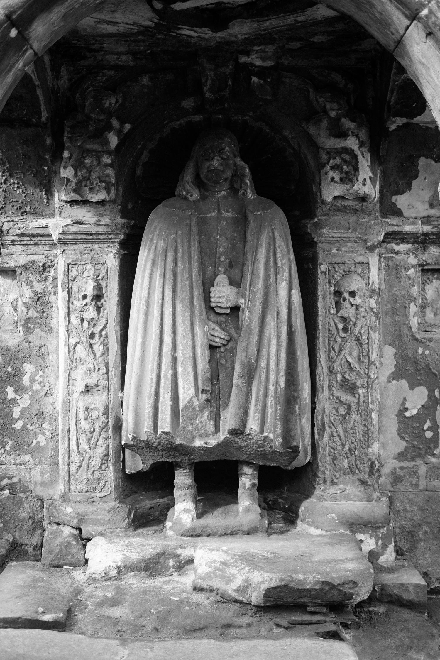 A statue in an old graveyard