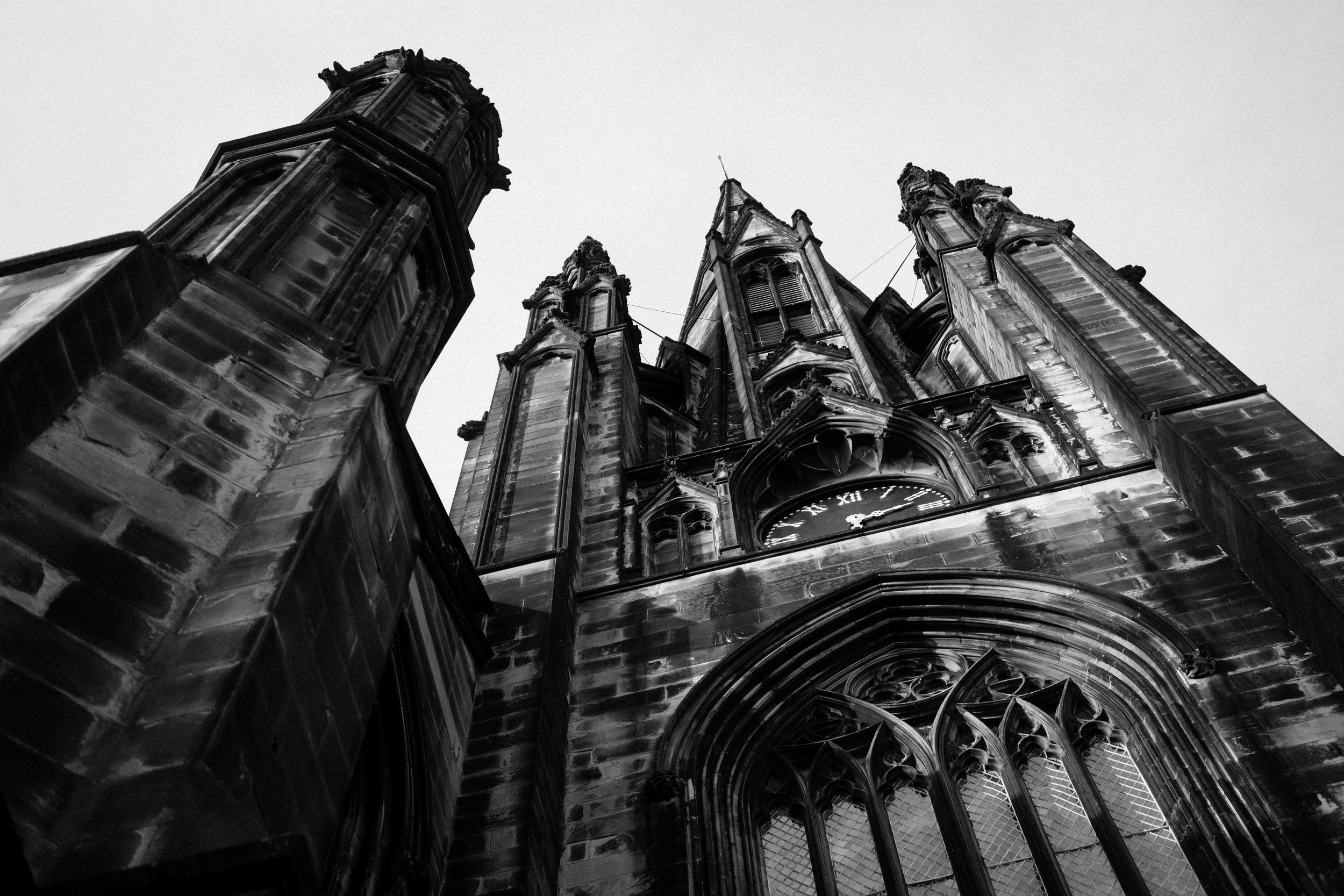 Looking up at a gothic church