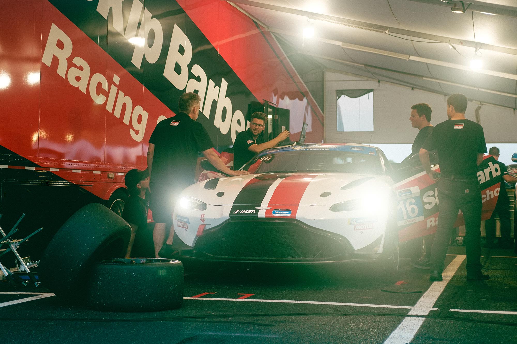 An Aston Martin Vantage in the paddock