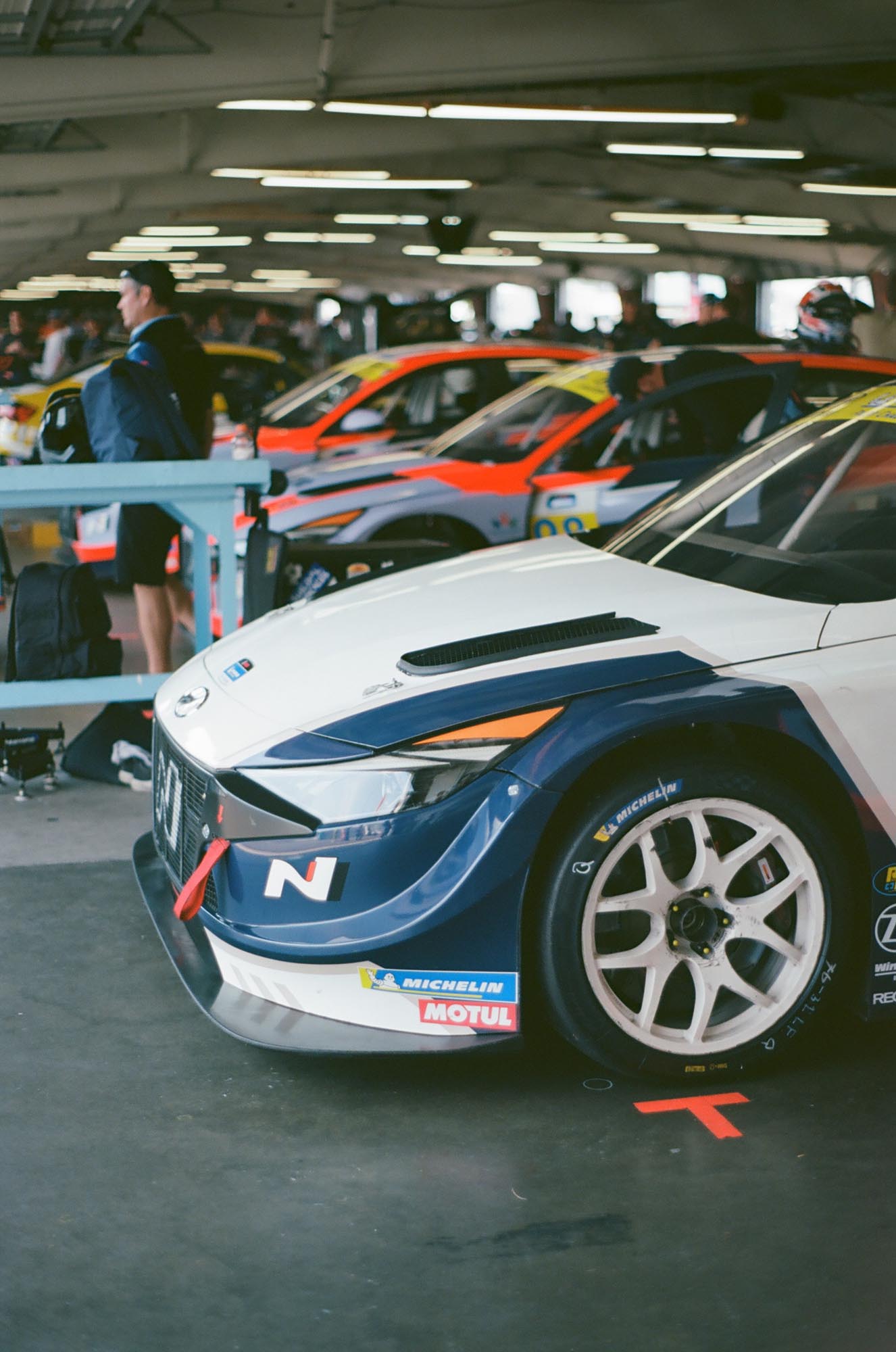 The front of a Hyundai touring car in the garage